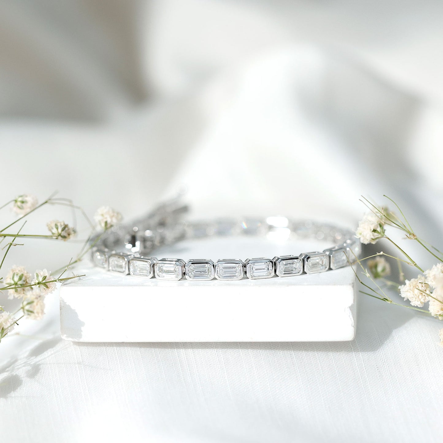Emerald Cut Lab Grown Diamond Tennis Bracelet in Bezel Setting