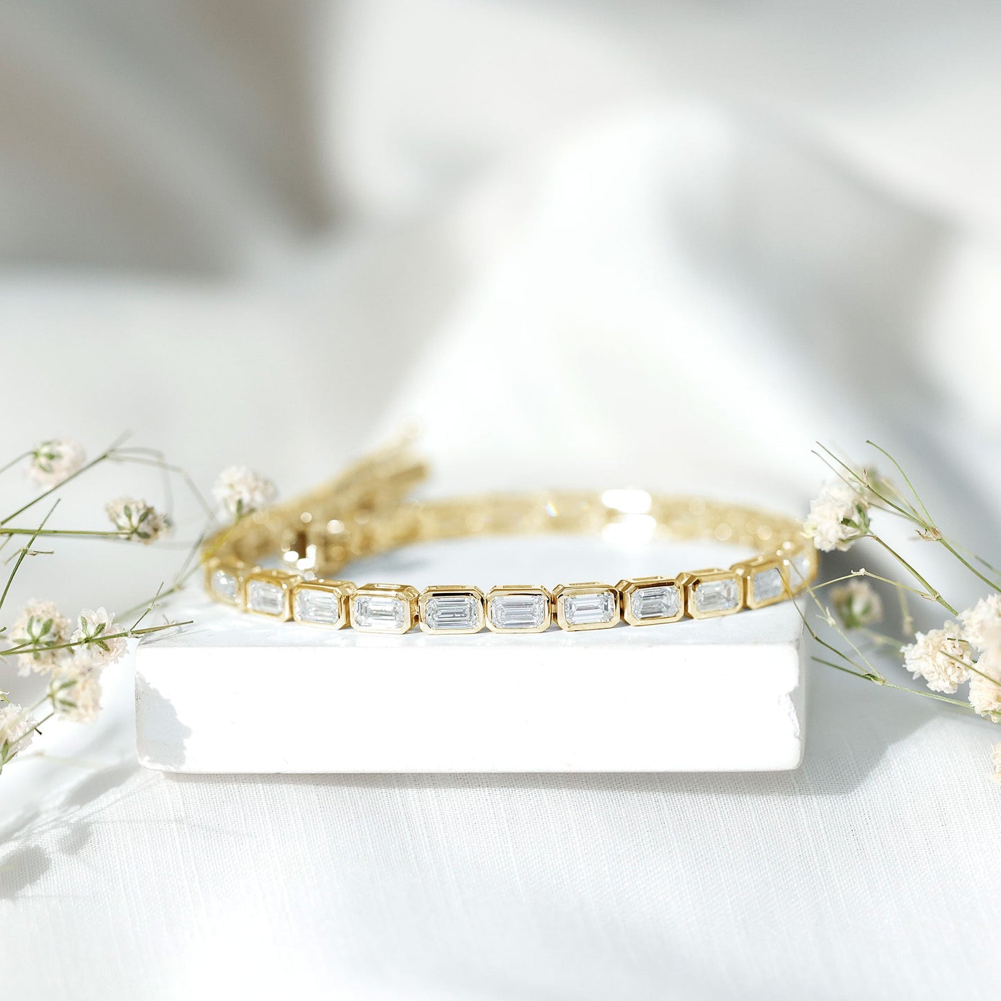 Emerald Cut Lab Grown Diamond Tennis Bracelet in Bezel Setting