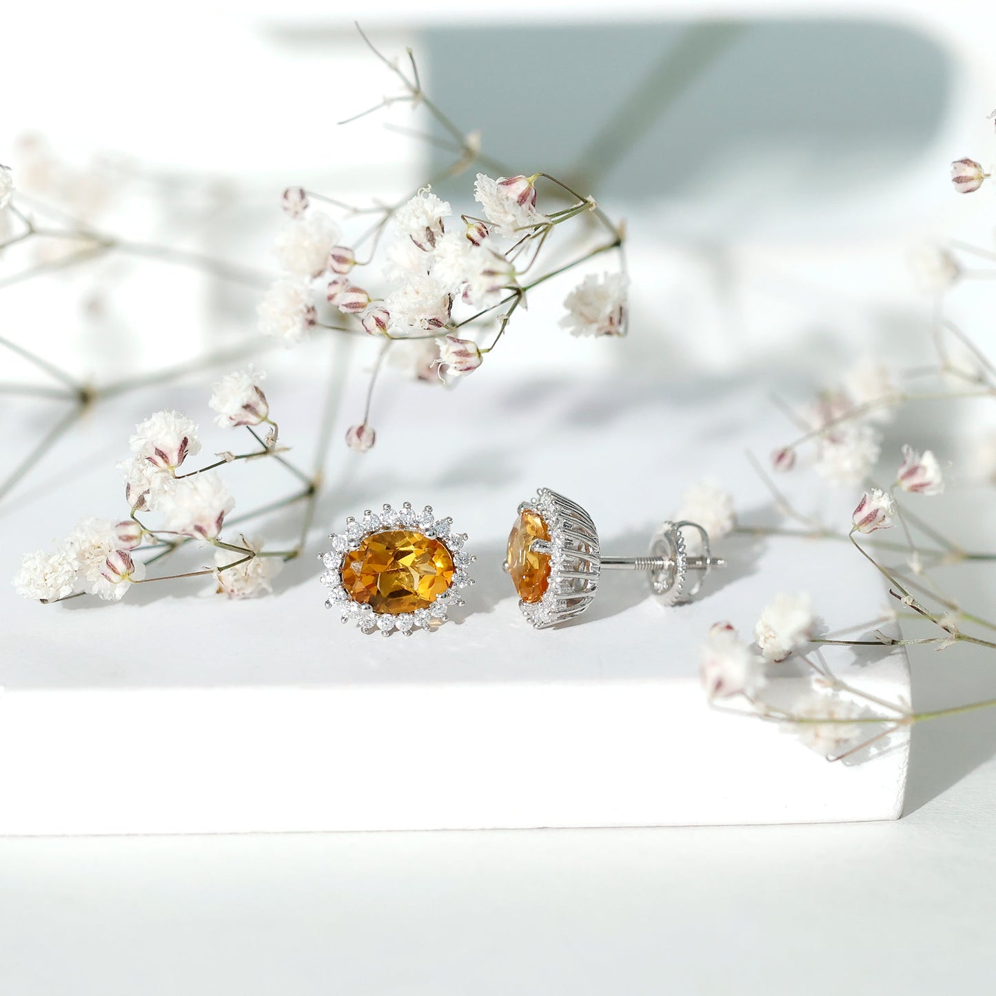 Oval Shaped 2.2 Carat Citrine Stud Earrings with Halo