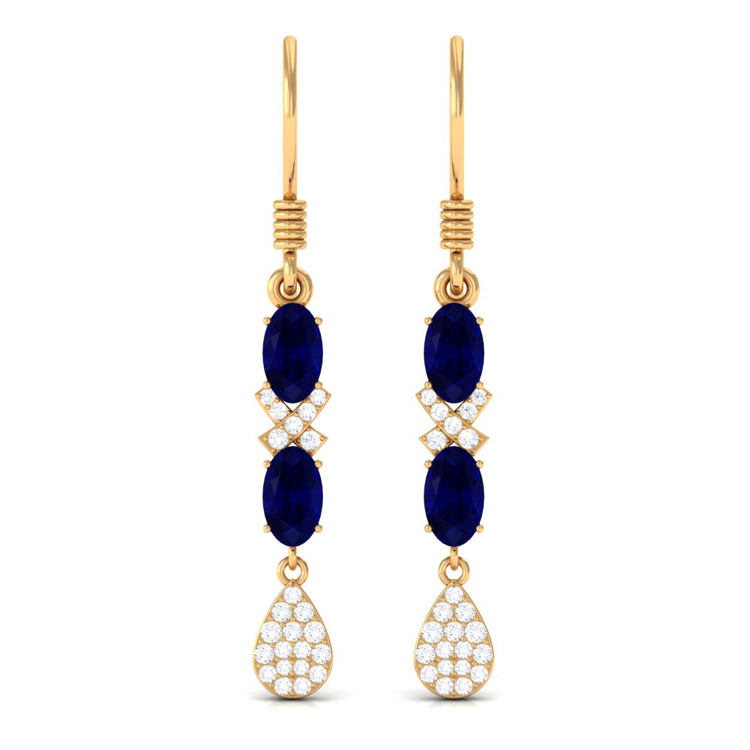Oval Cut Blue Sapphire and Diamond Dangle Earrings