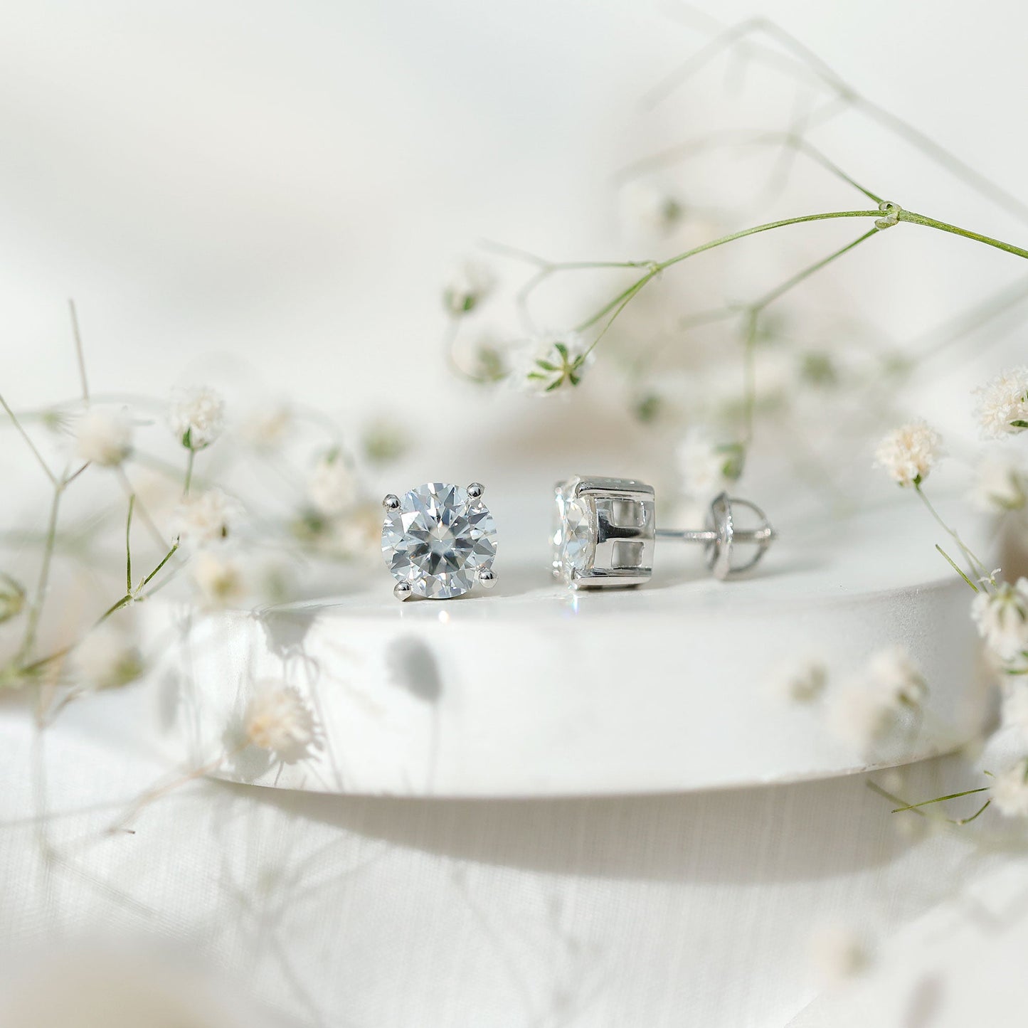 2.7 Carat Round Moissanite Studs in Claw Setting