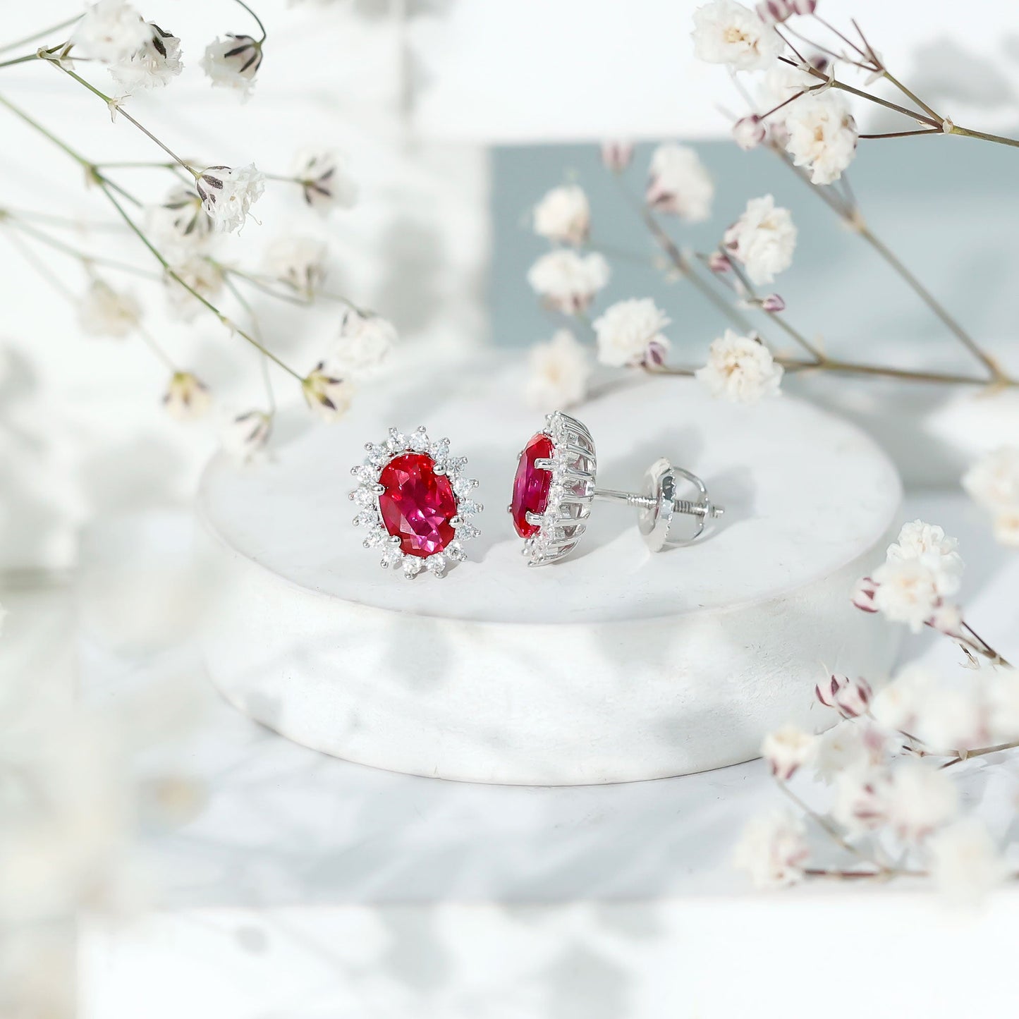 2 Carat Oval Cut Lab Grown Ruby Stud Earrings with Moissanite Halo