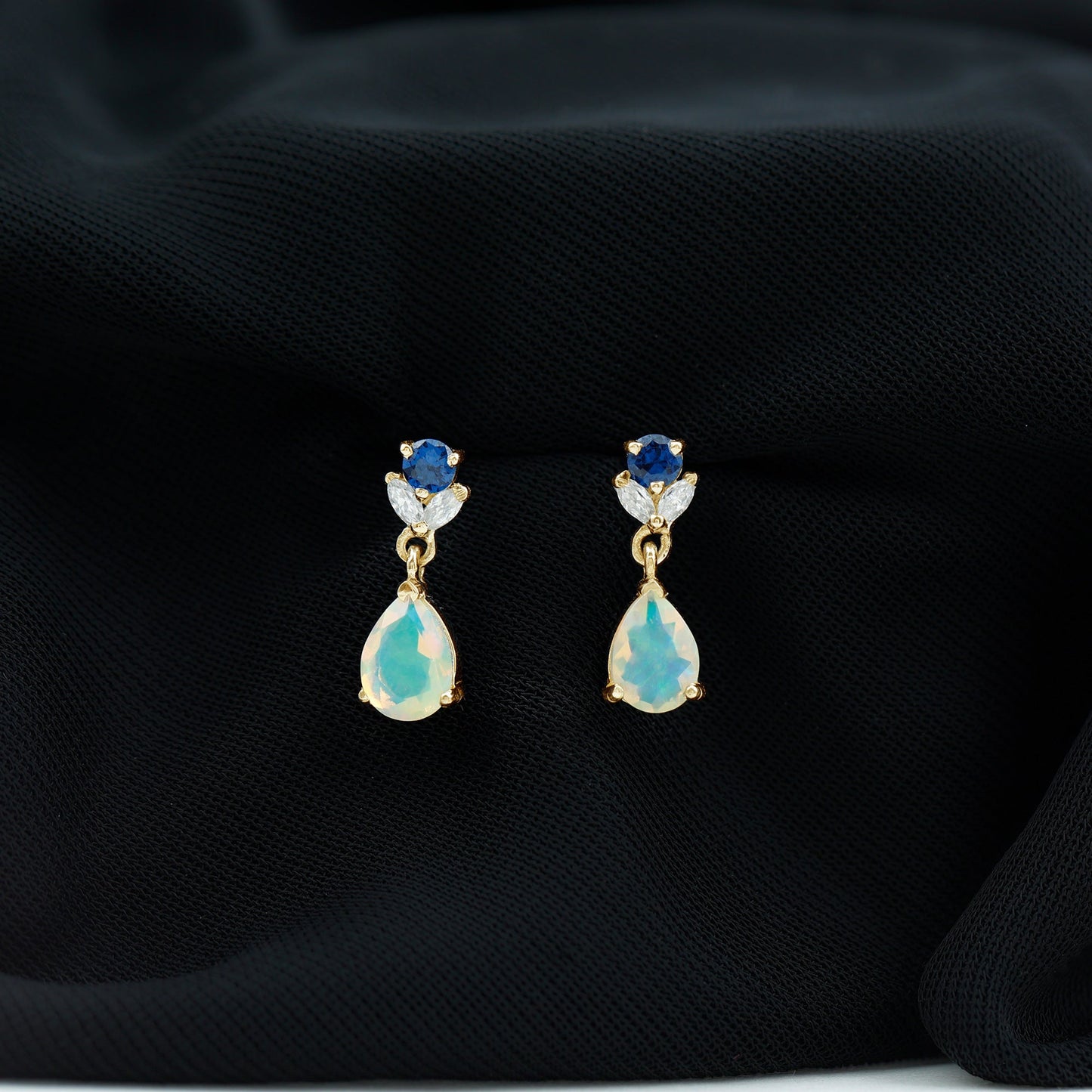 1.4 Carat Ethiopian Opal Teardrop Earrings with Lab Blue Sapphire