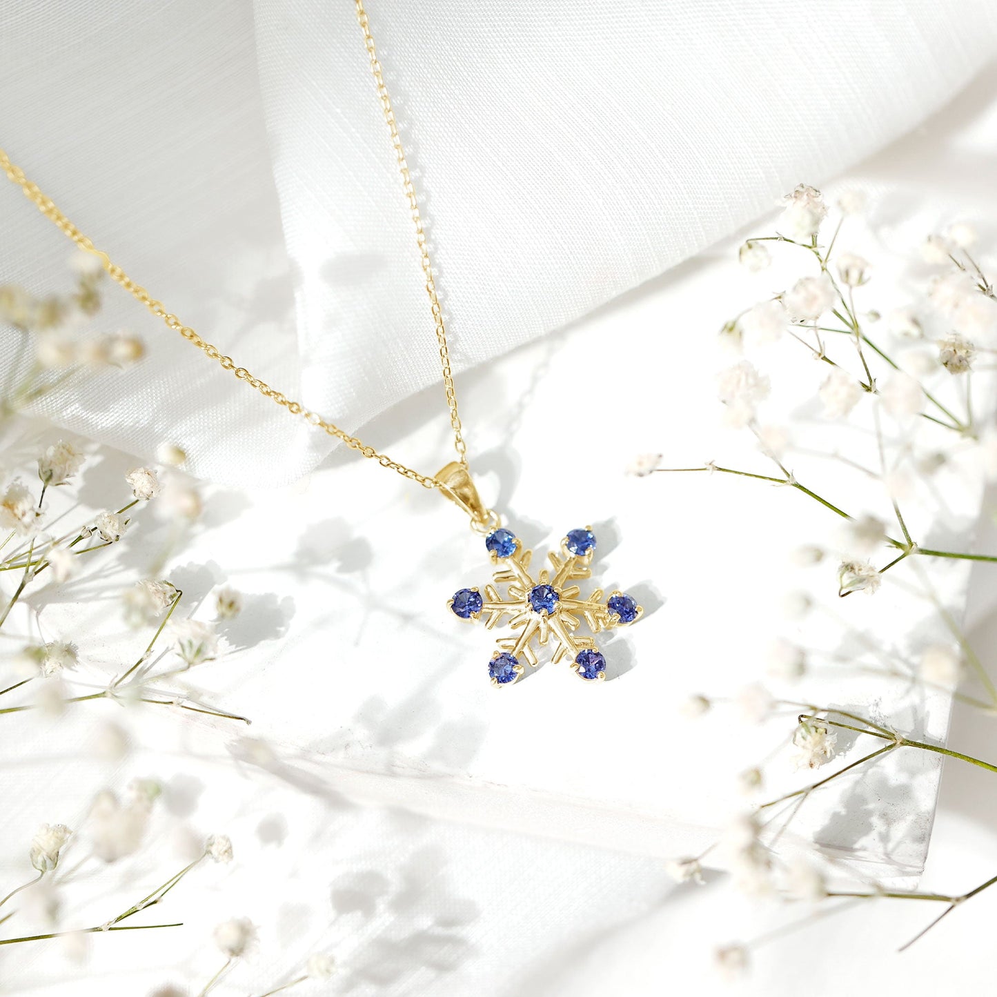 Lab Created Blue Sapphire Snowflake Pendant Necklace With Chain