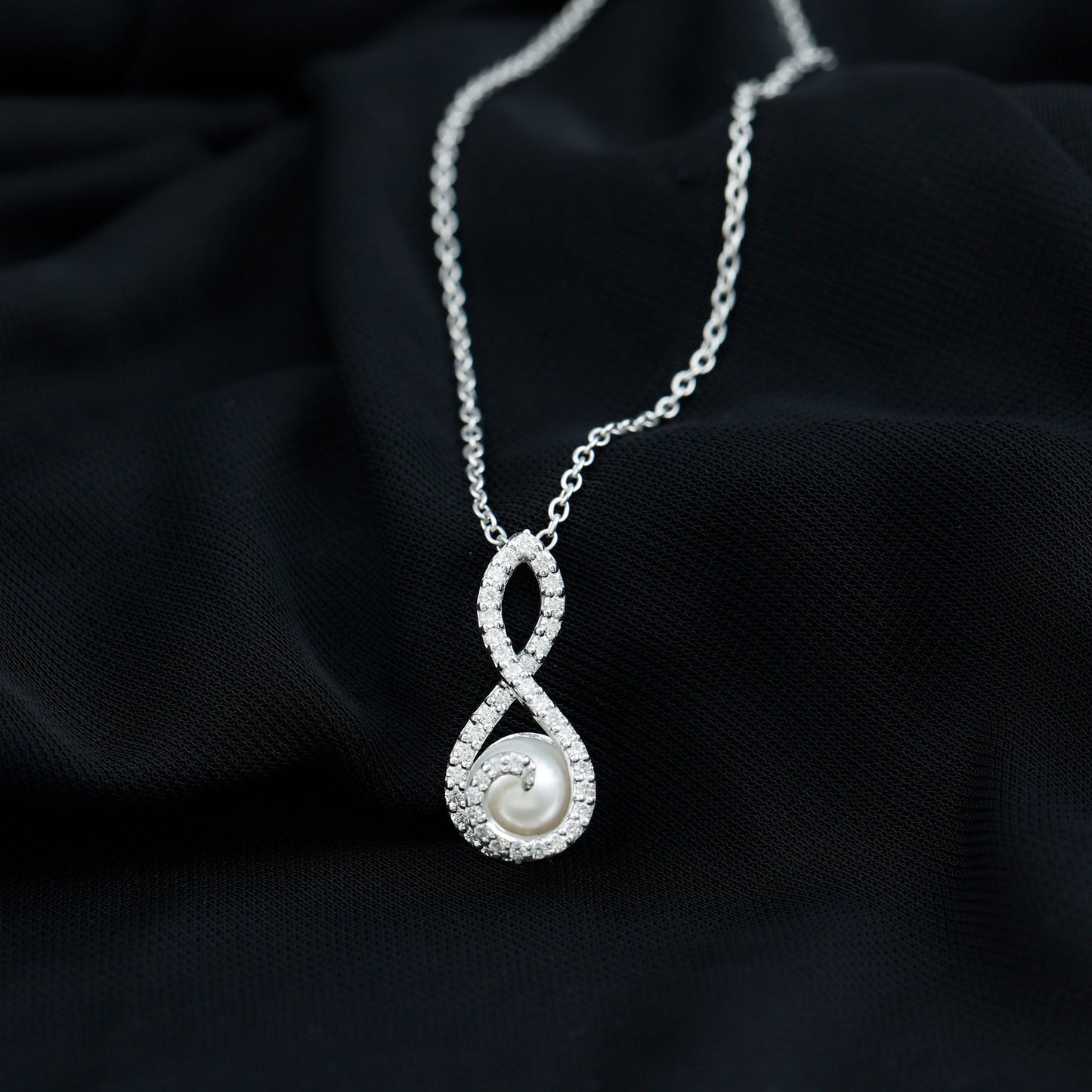 Freshwater White Pearl and Moissanite Infinity Pendant in Silver