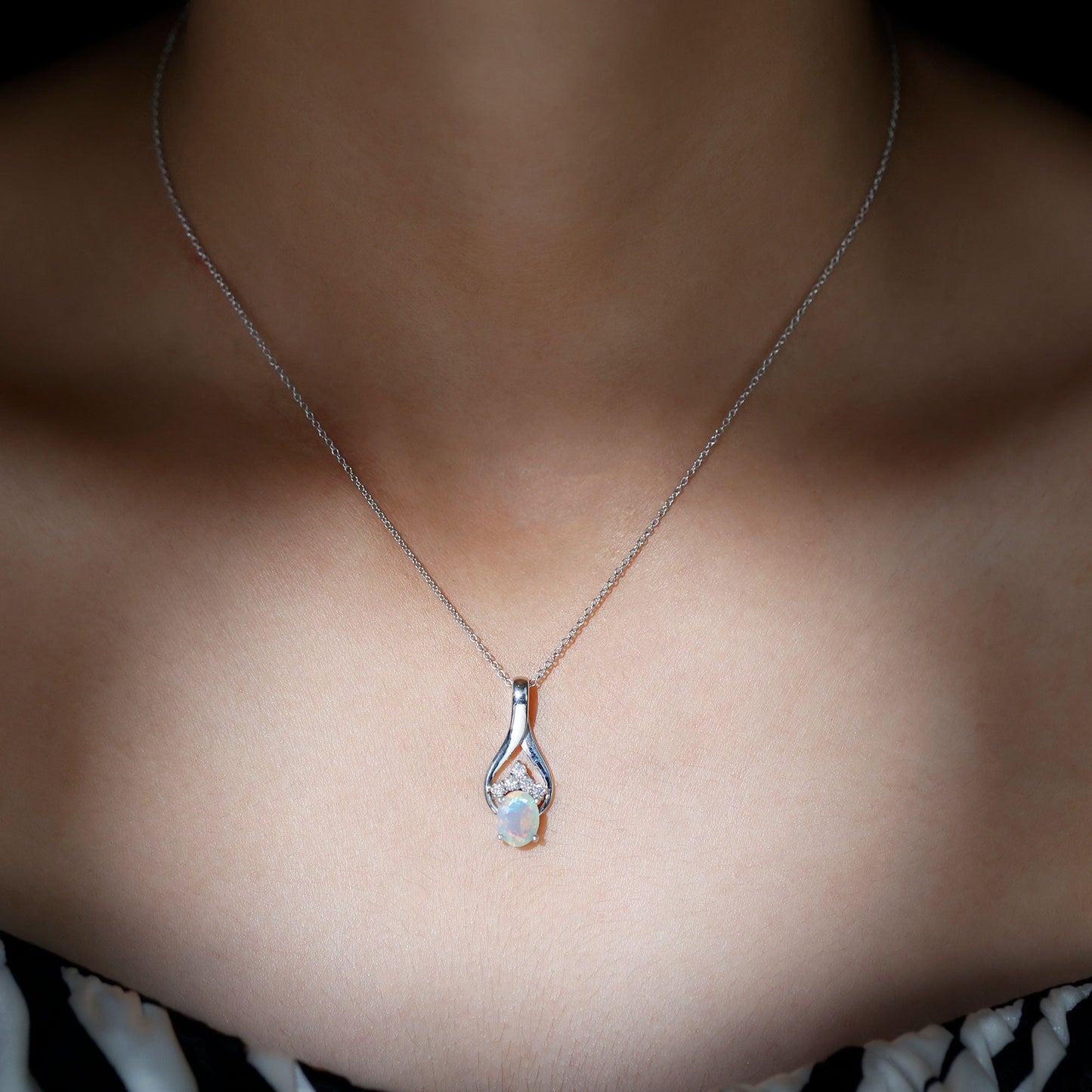 1.2 Carat Oval Ethiopian Opal Teardrop Pendant in Silver