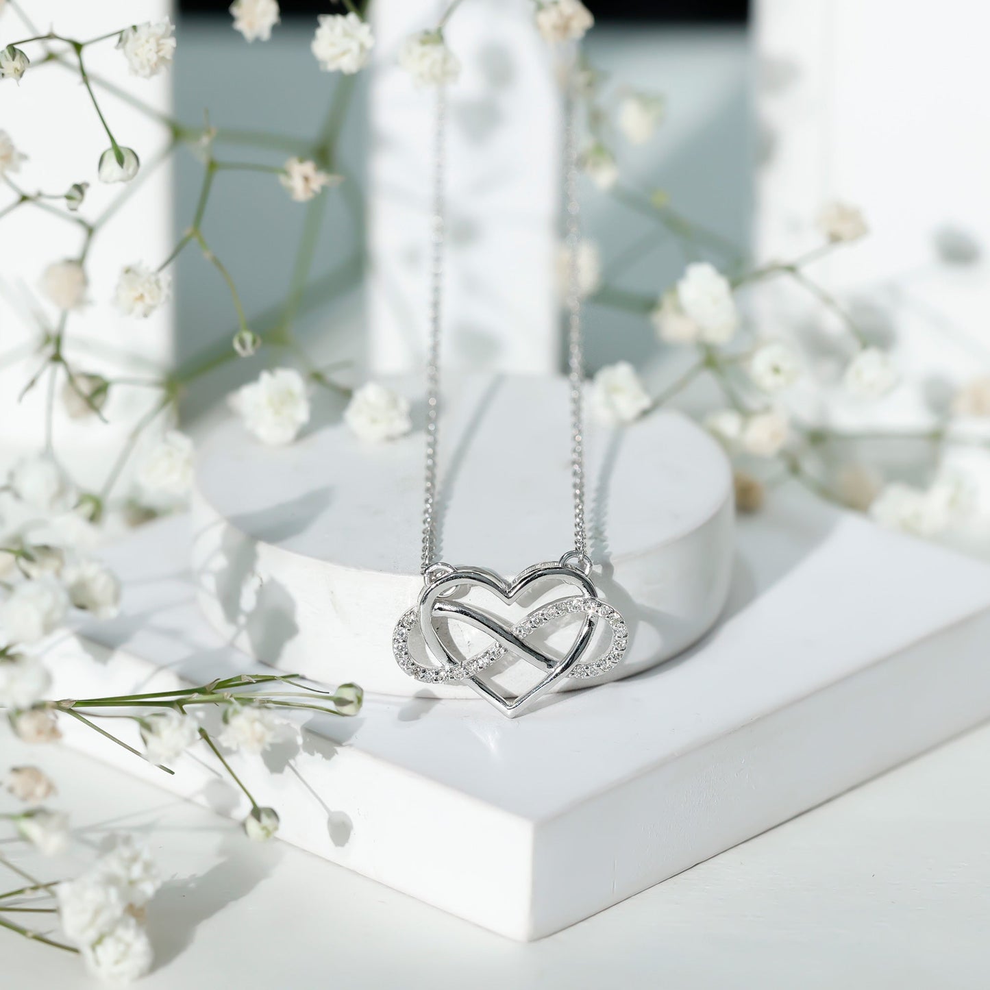 Moissanite Infinity Heart Necklace In Sterling Silver