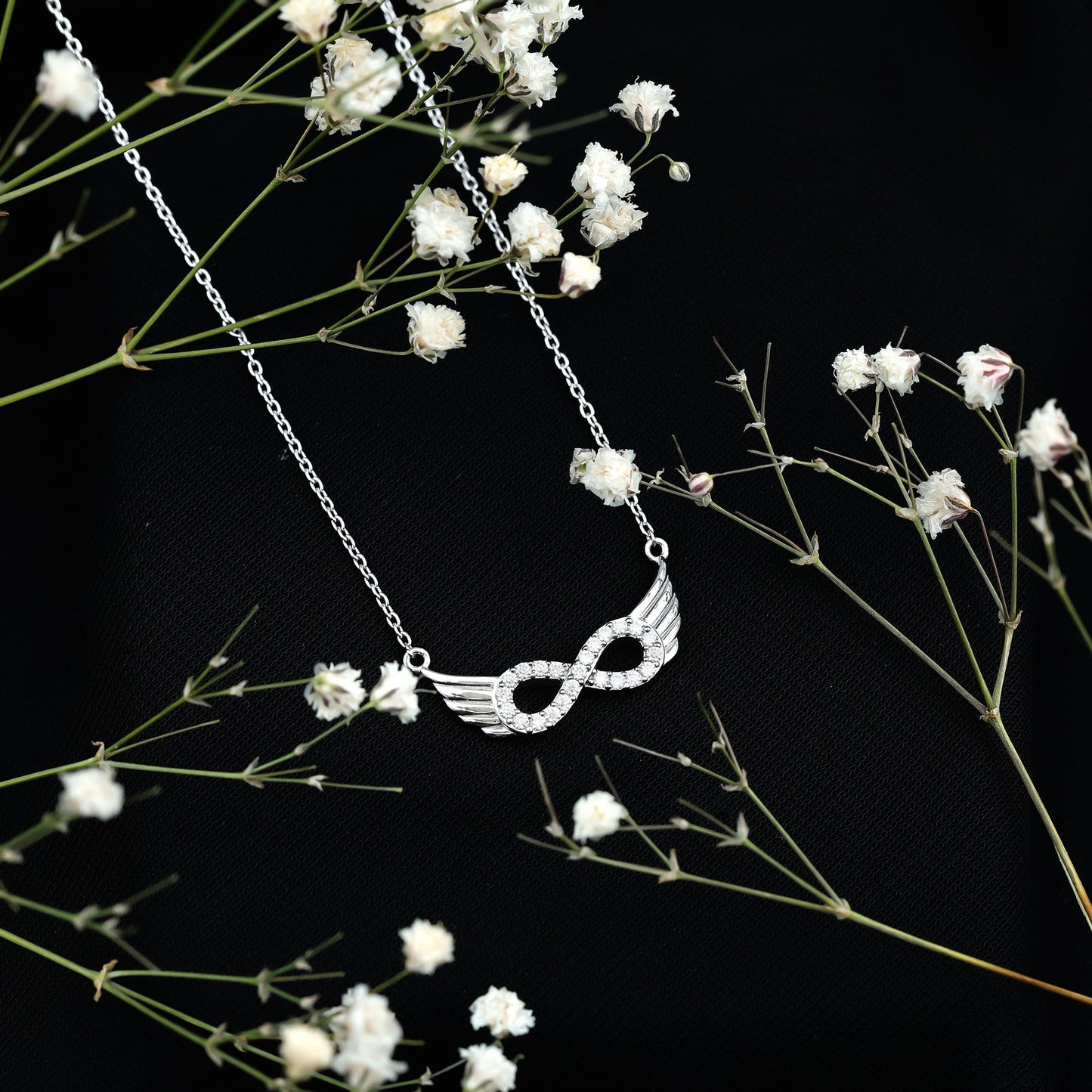 Sterling Silver Pave Set Moissanite Infinity Necklace with Wings