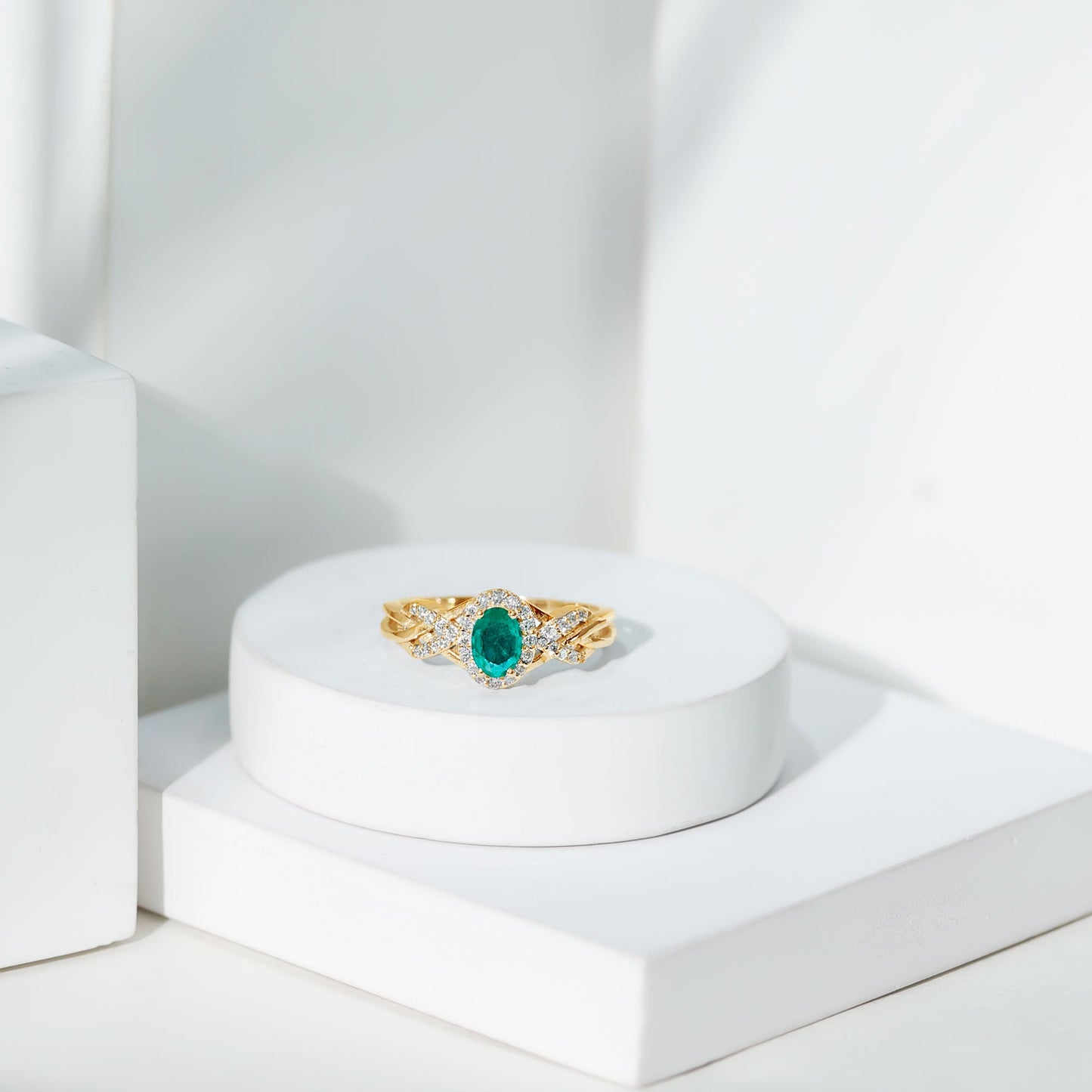 Designer Emerald Oval Engagement Ring with Diamond Halo