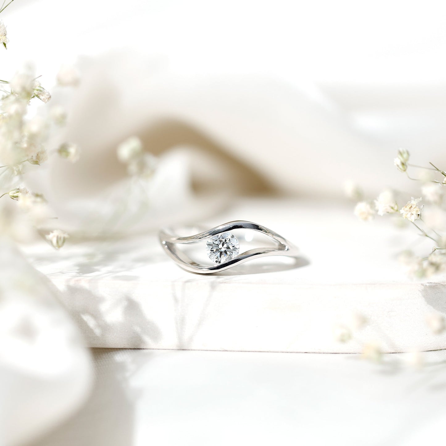 Certified 0.98 Carat Round Moissanite Solitaire Ring with Tension Setting