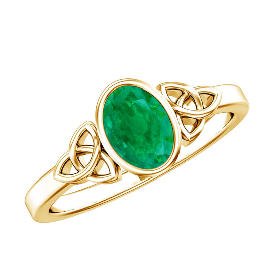 Oval Shaped Emerald Celtic Engagement Ring in Bezel Setting