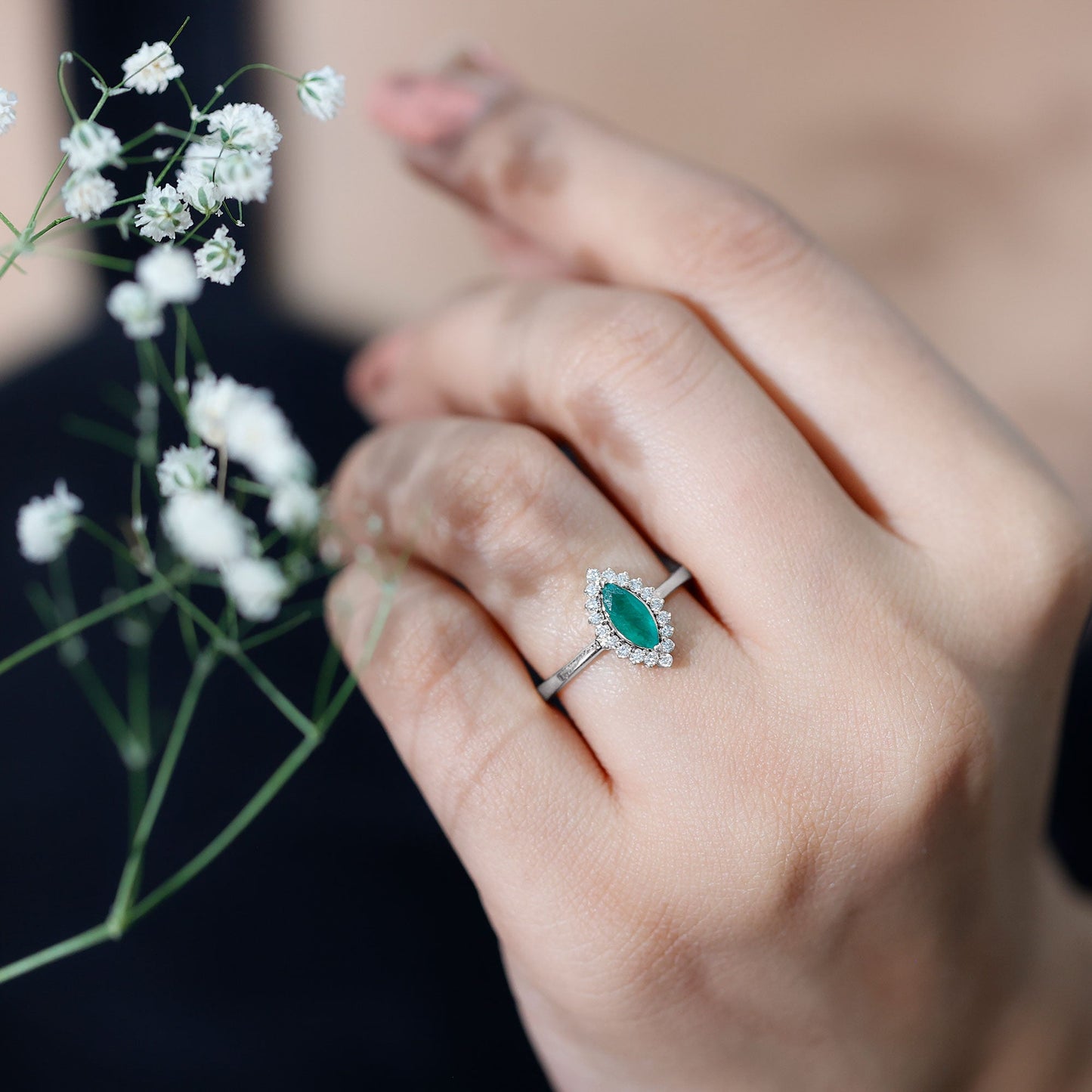 Elongated Marquise Cut Emerald Engagement Ring with Diamond Halo