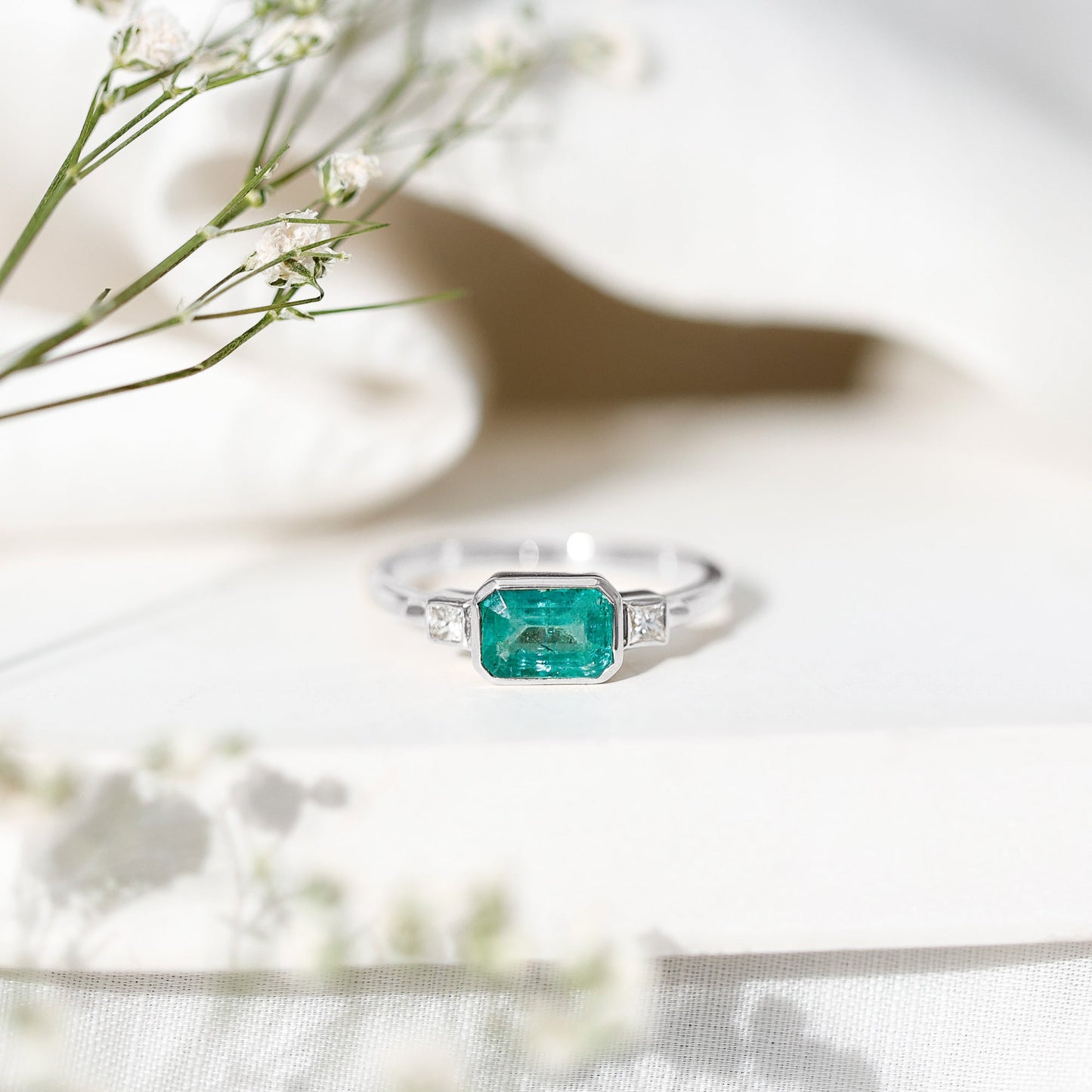 Octagon shape Emerald and Diamond East-West Promise Ring in Bezel Setting