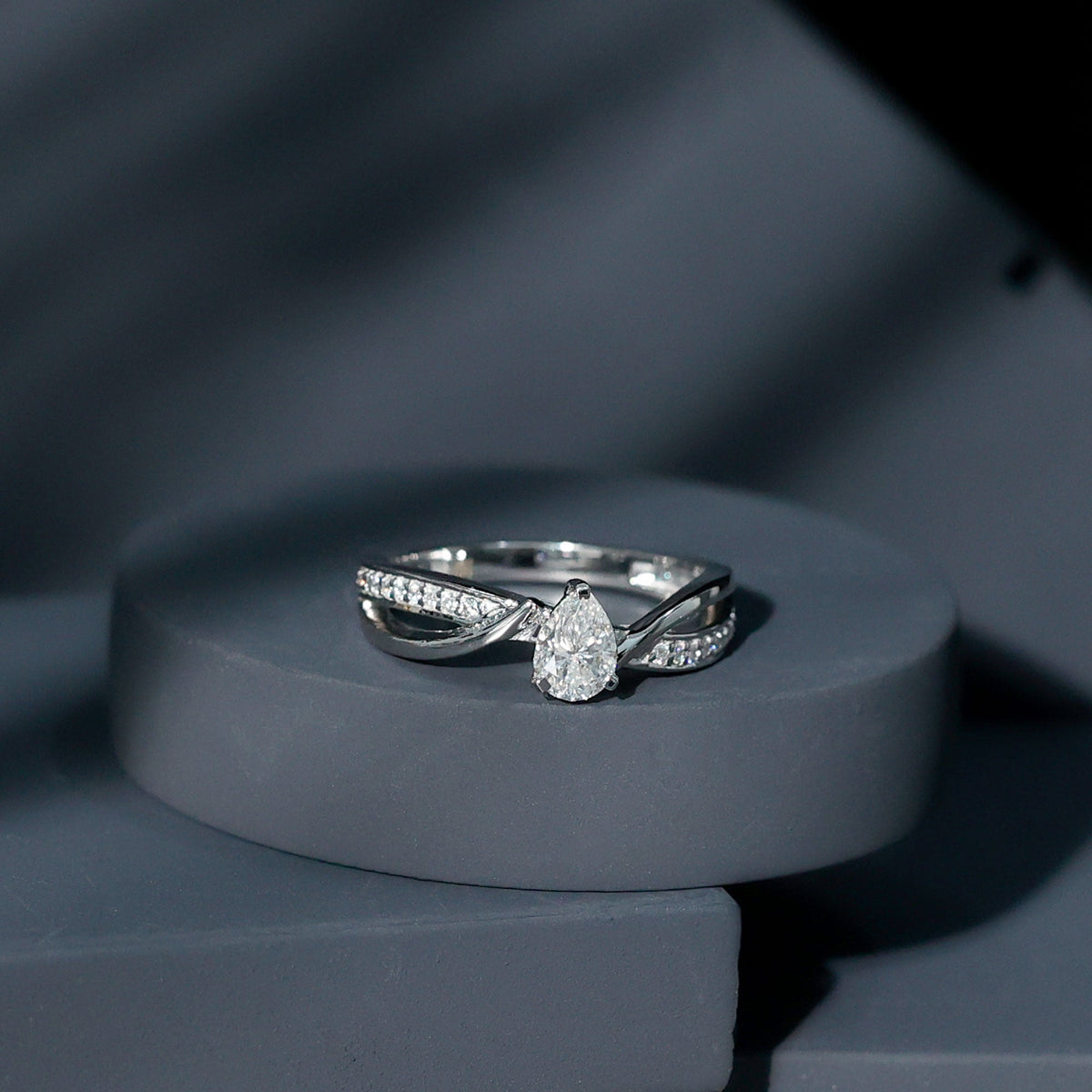 Certified 0.6 Carat Pear Cut Lab Grown Diamond Infinity Engagement Ring