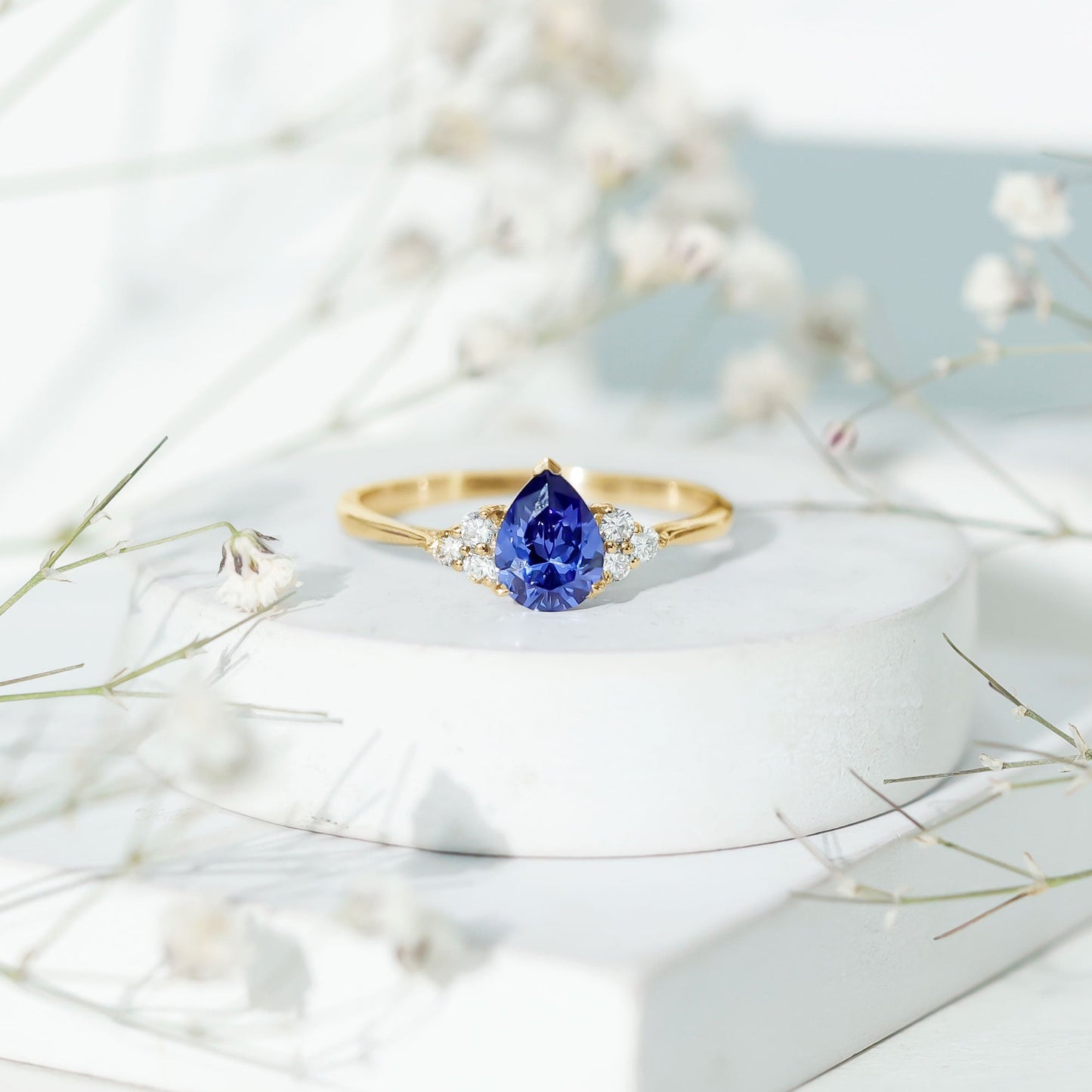 1.6 Carat Lab Blue Sapphire Teardrop Engagement Ring with Diamond Trio