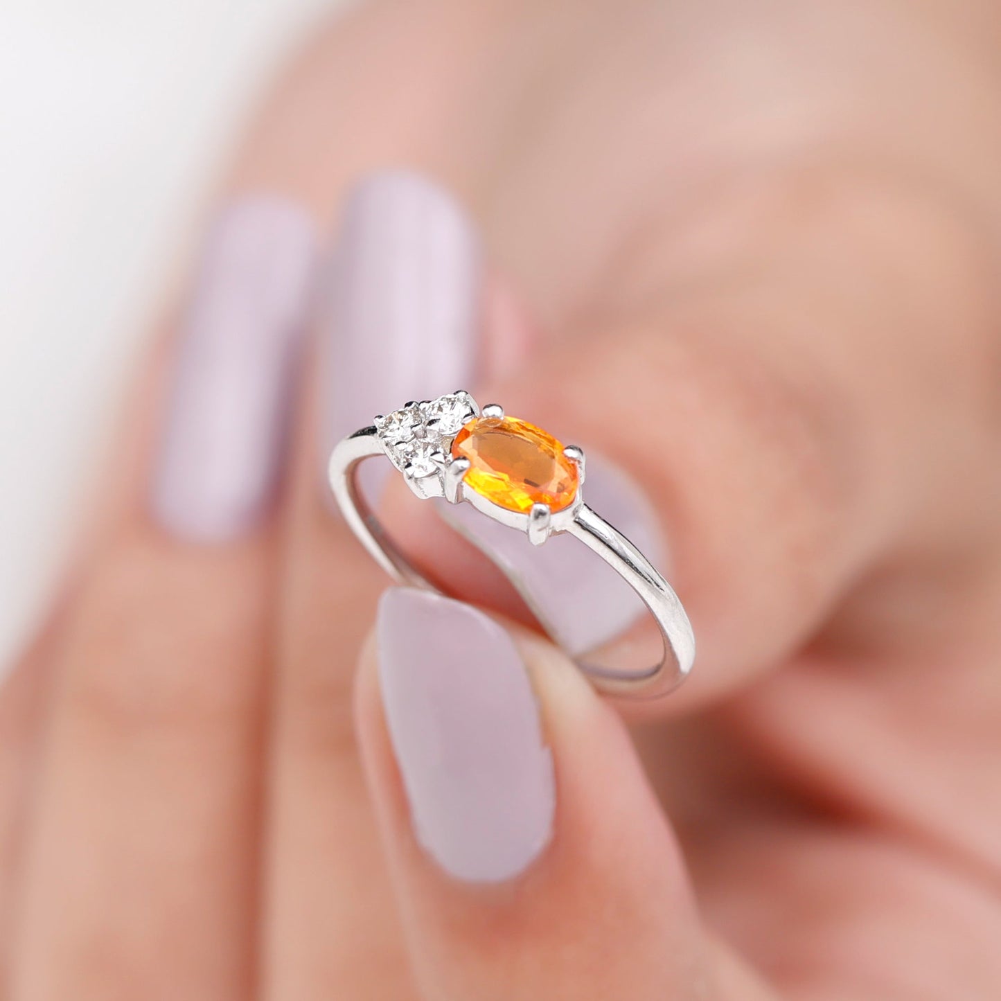 Oval Cut Fire Opal Promise Ring with Diamond Trio