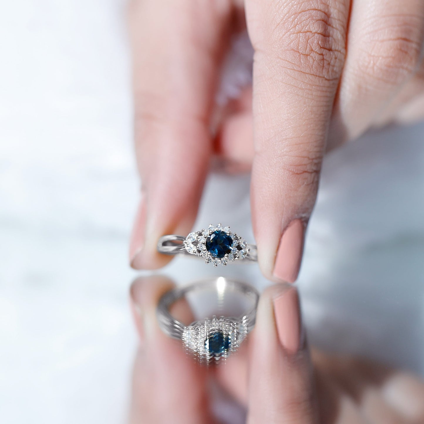 0.6 Carat London Blue Topaz Floral Engagement Ring with Diamond