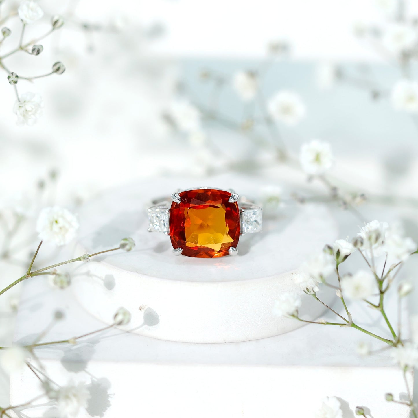 9 Carat Cushion Cut Lab Grown Orange Sapphire 3 Stone Engagement Ring
