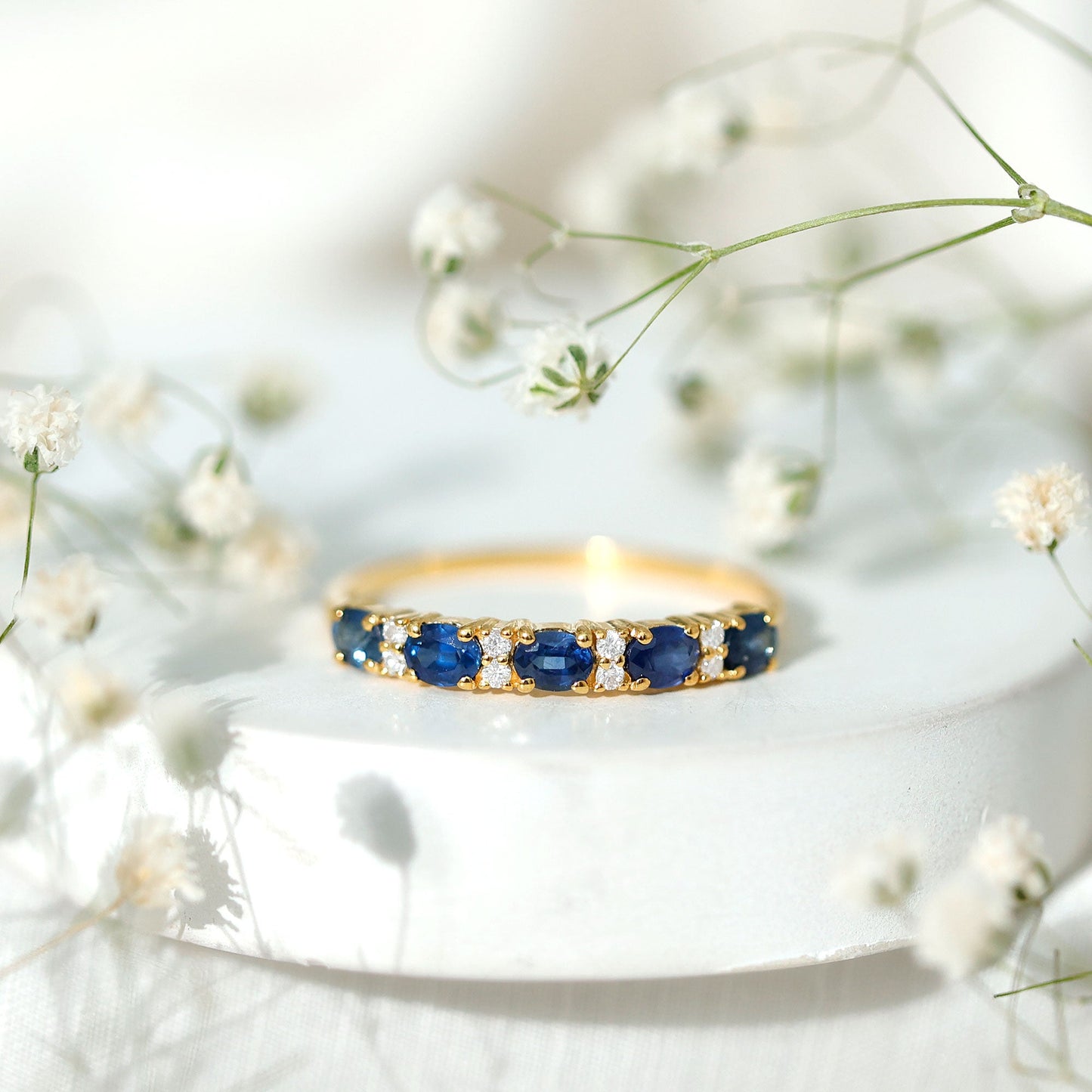 Natural 0.8 Carat Oval Blue Sapphire and Diamond Half Eternity Wedding Band