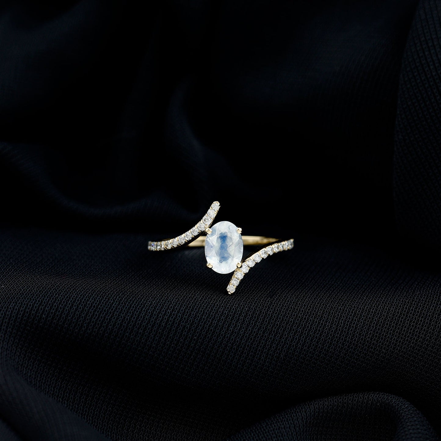 Oval Moonstone and Diamond Bypass Engagement Ring