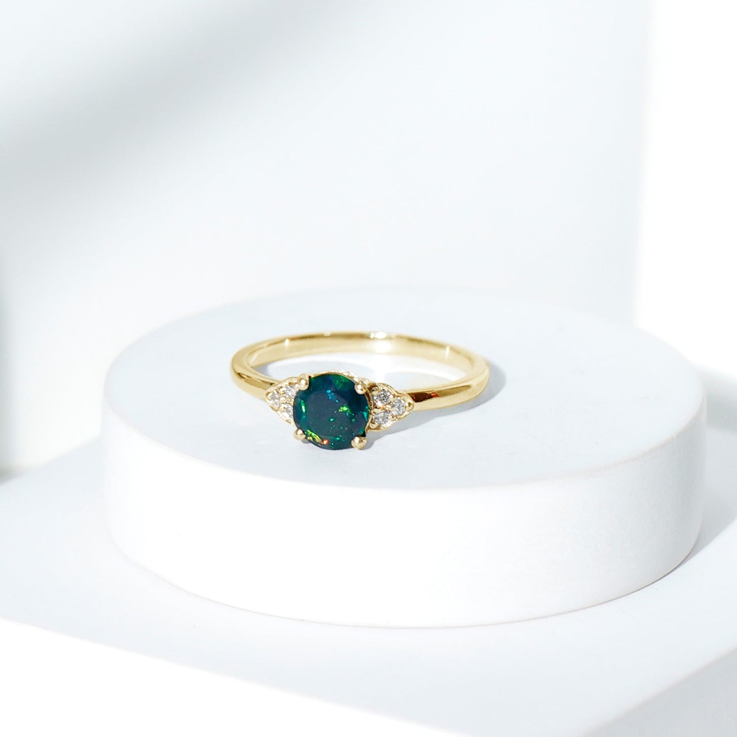 Real Black Opal Round Engagement Ring with Diamond Trio
