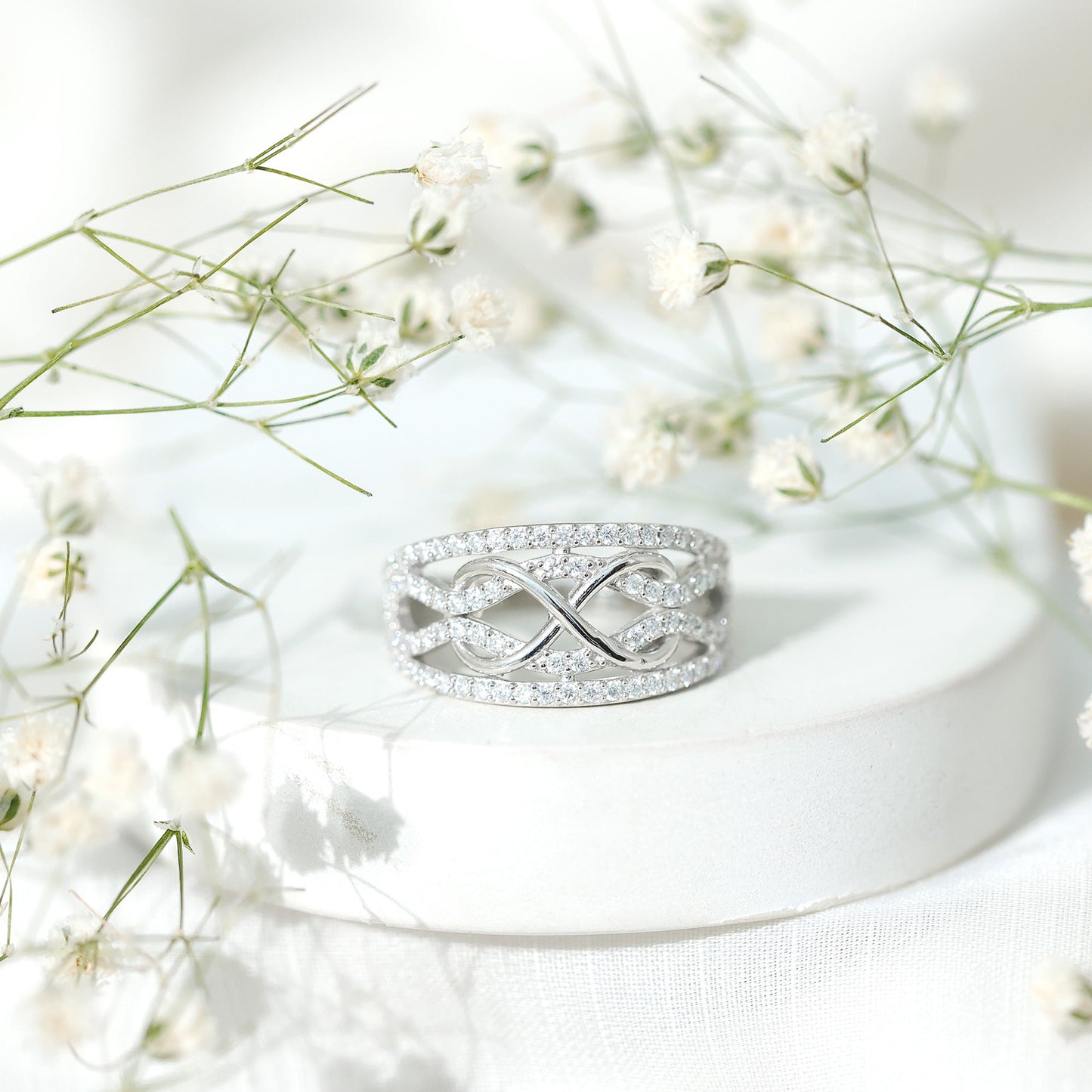 Designer Moissanite Infinity Anniversary Band in Silver