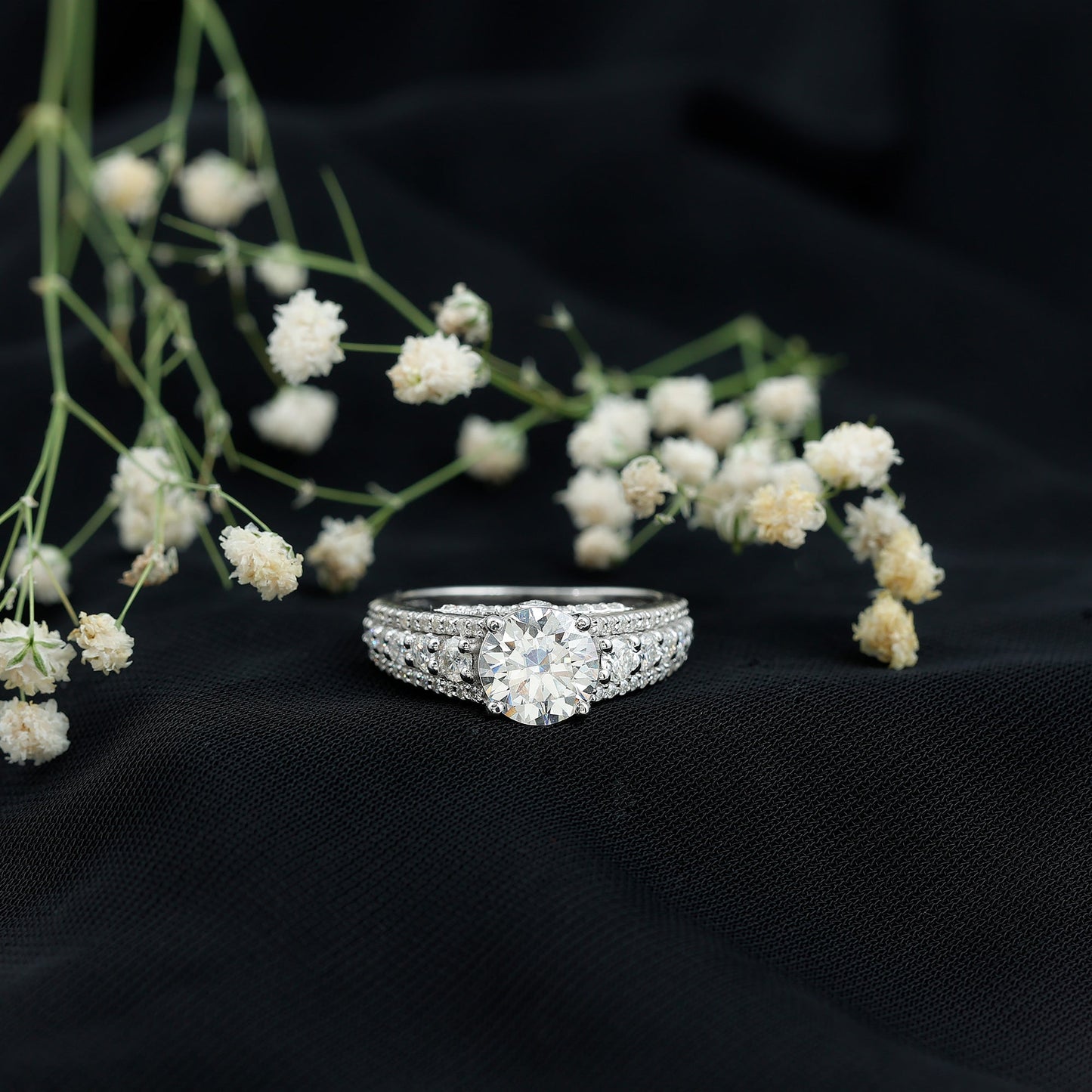 Round Brilliant Cut Moissanite Side Stone Engagement Ring