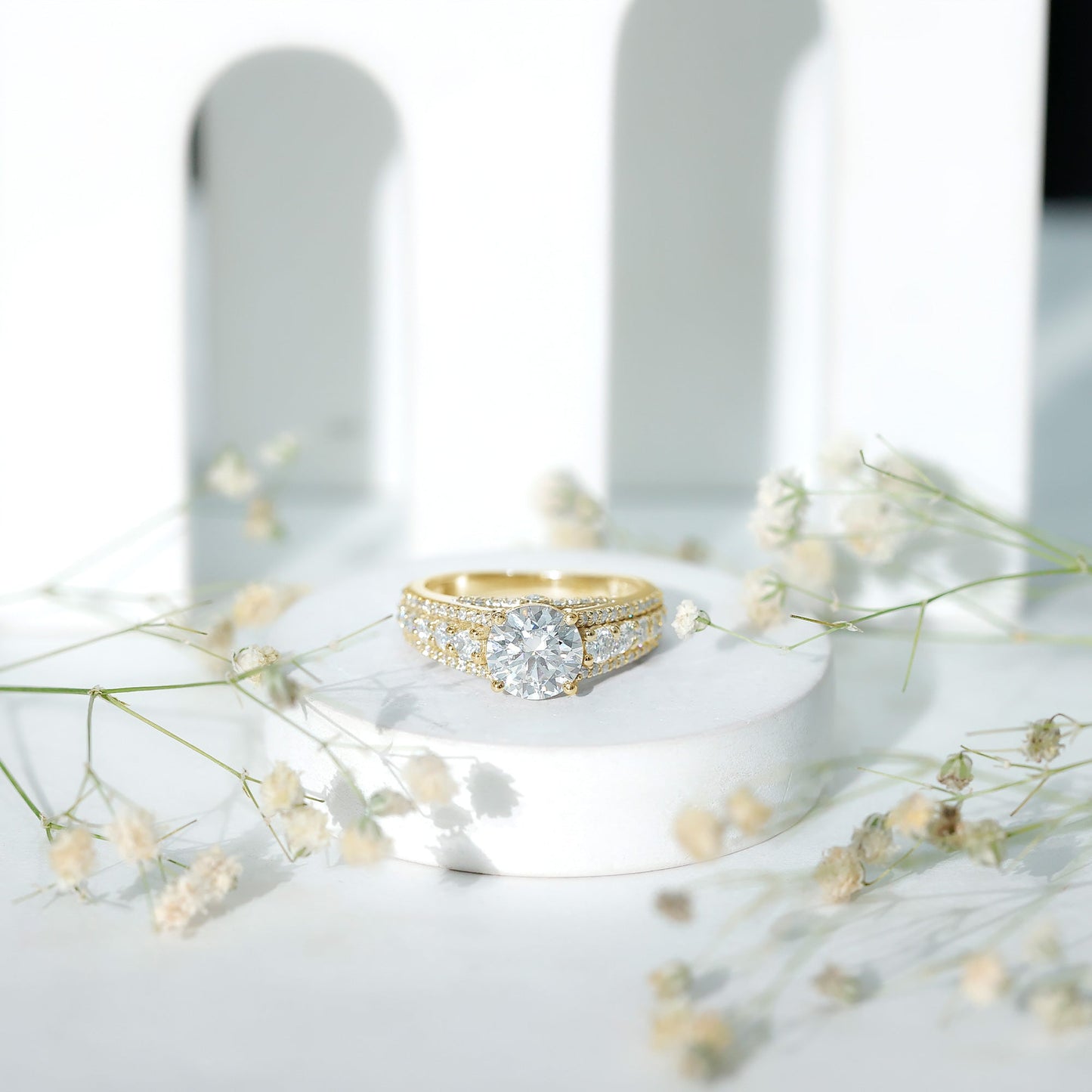 Round Brilliant Cut Moissanite Side Stone Engagement Ring