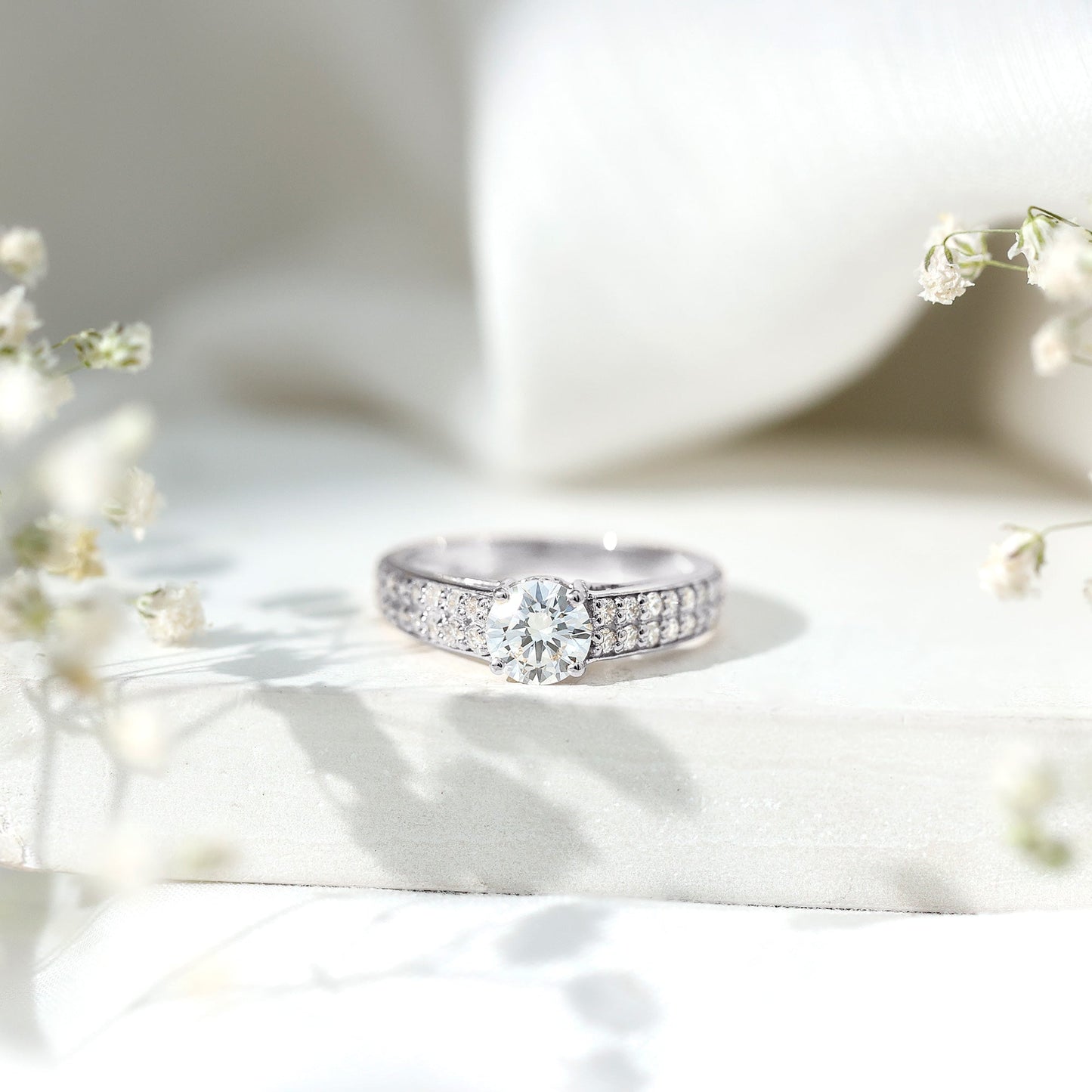 Round Moissanite Engagement Ring with Side Stones