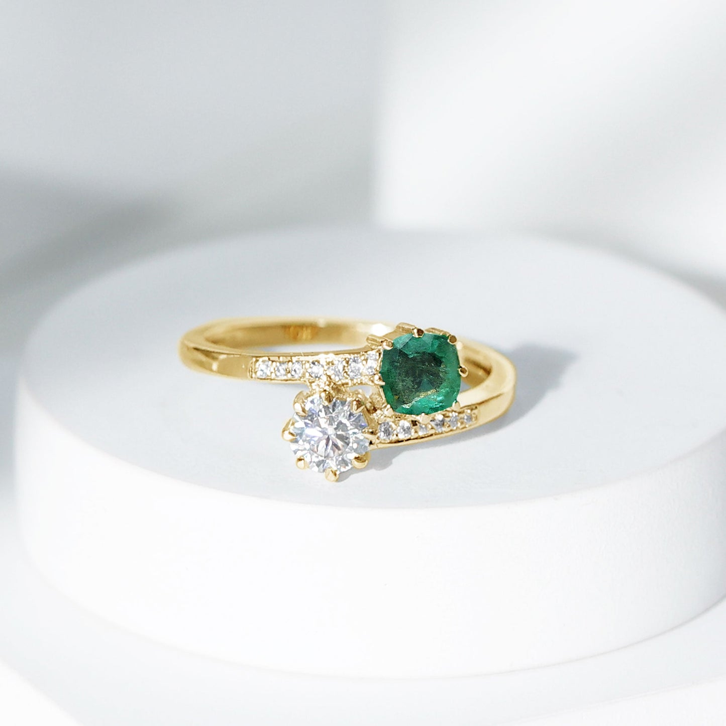 Emerald and Moissanite Two Stone Engagement Ring in Bypass Shank