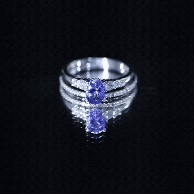 Natural 0.9 Carat Tanzanite and Diamond Oval Engagement Ring with Wedding Band