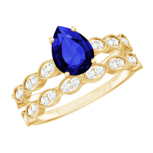 1.6 Carat Pear Lab Grown Blue Sapphire Engagement Ring with Diamond Band