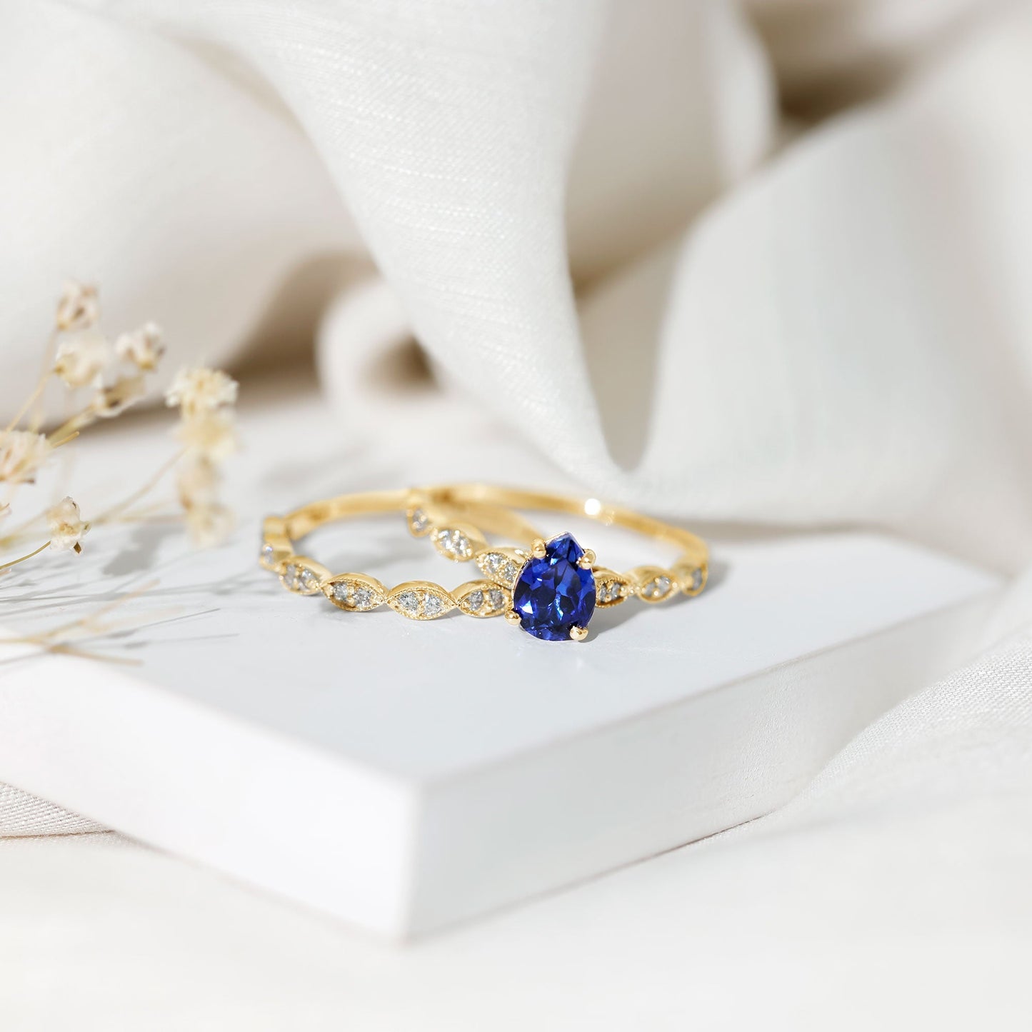 1.6 Carat Pear Lab Grown Blue Sapphire Engagement Ring with Diamond Band