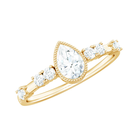 0.7 Carat Pear Cut Moissanite Solitaire Engagement Ring with Beaded Details